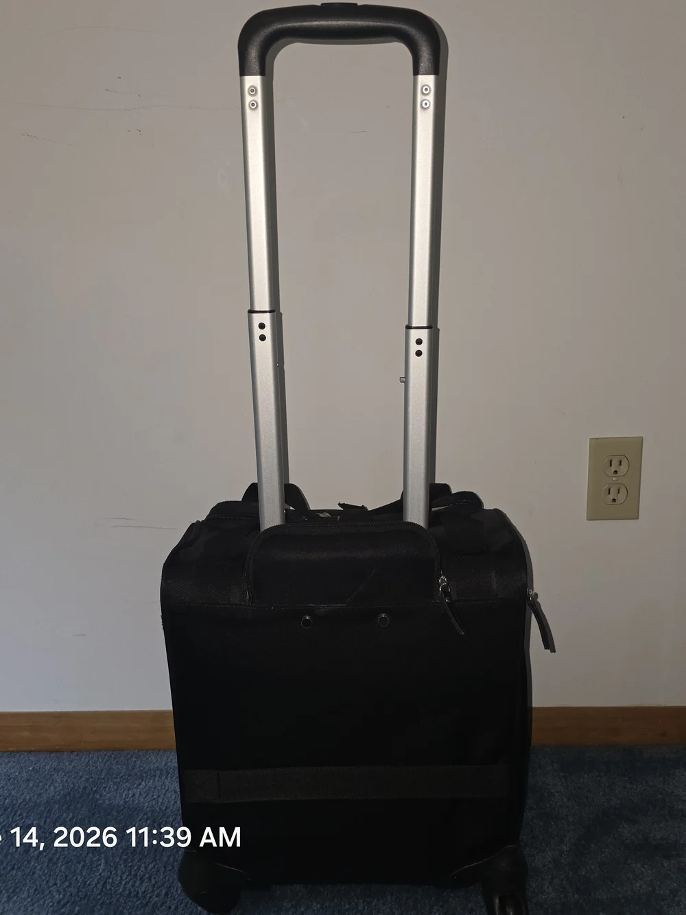 Samsonite Black Compact Rolling Travel Bag with Front and Side Zip Pocket